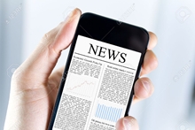 12449108-A-man-holding-mobile-smart-phone-with-news-article-on-screen-Closeup-shot--Stock-Photo